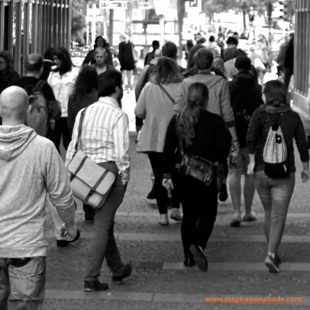 Spending time in a crowded place for at least 10–15 minutes